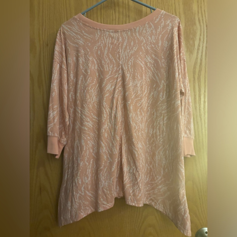 Pink colored with cream colored animal type print top. Size Medium LuLaRoe - Picture 2 of 4
